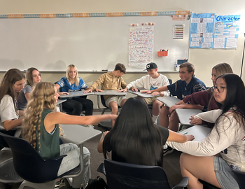 Students sitting in a circle