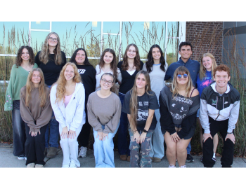 Group photo of the 16 students