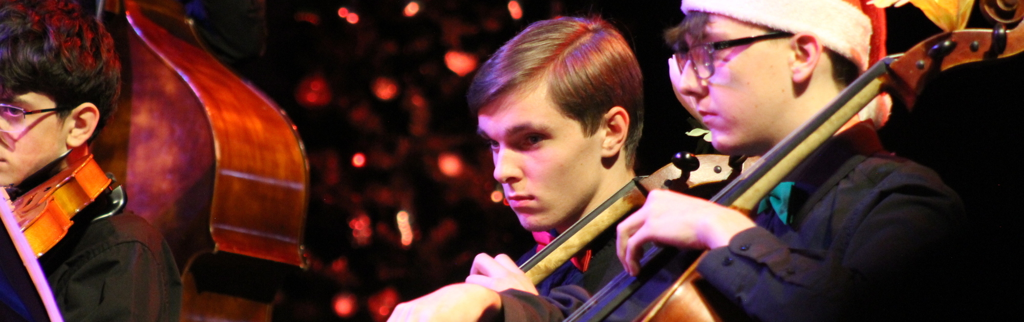 Two cello players during HS Holiday Collage Concert.
